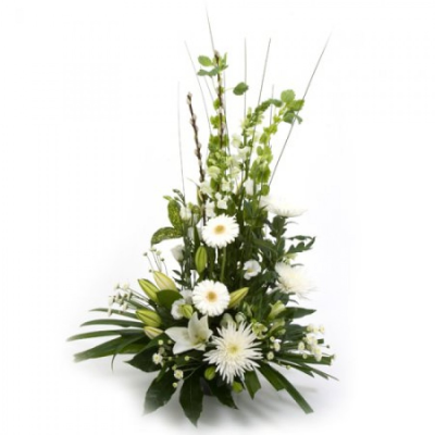 Wintry Whites - This Lovely white and green arrangement is available for delivery. A local delivery cost is deducted from your overall total when purchasing. This is a sleek, stylized, and modern design. Ready to display in any environment. Buy these gorgeous flowers as a gift or to treat yourself. This beautiful arrangement is made in floral foam, meaning they are ready to go, so no extra care required! Just set down your gorgeous flowers and enjoy! Add a custom card message to your order to let the recipi...